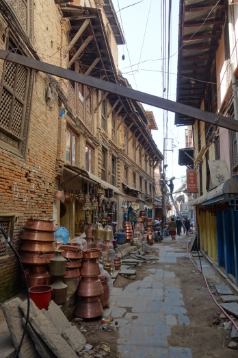 Copperware merchants in the backstreets of Patan.